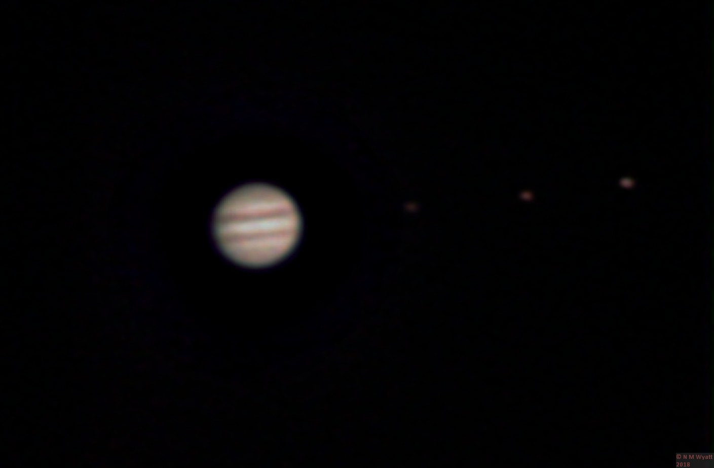 Jupiter and three moons